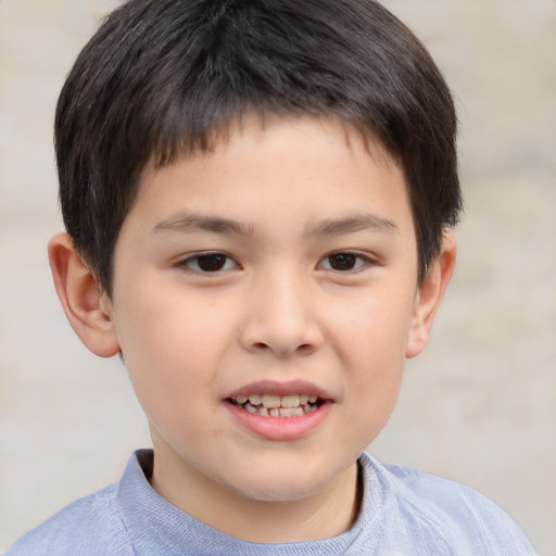 Joyful white child male with short  brown hair and brown eyes