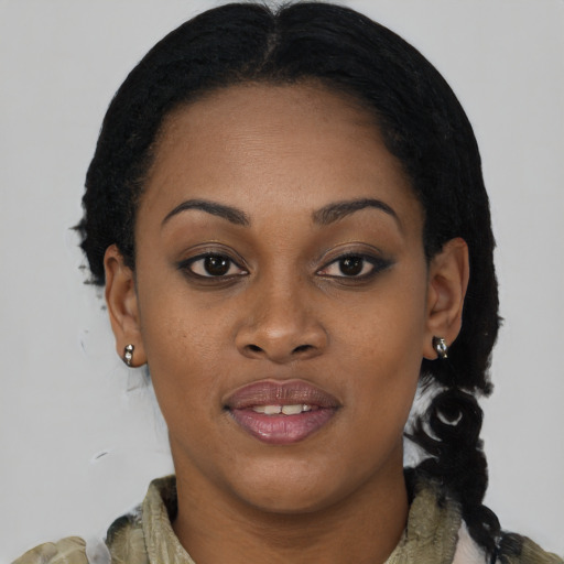 Joyful black young-adult female with medium  brown hair and brown eyes