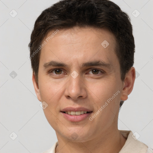 Joyful white young-adult male with short  brown hair and brown eyes