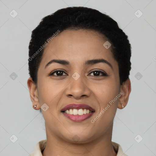 Joyful latino young-adult female with short  black hair and brown eyes