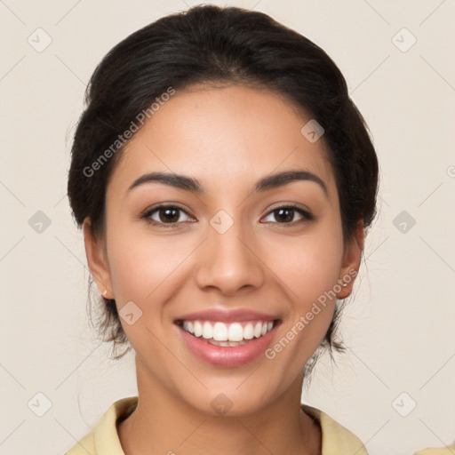 Joyful latino young-adult female with medium  brown hair and brown eyes