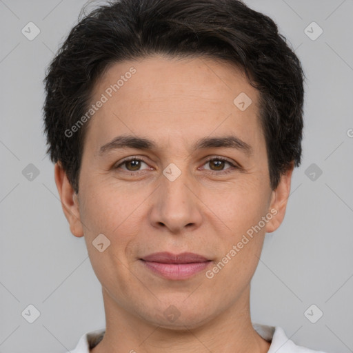 Joyful white adult male with short  brown hair and brown eyes