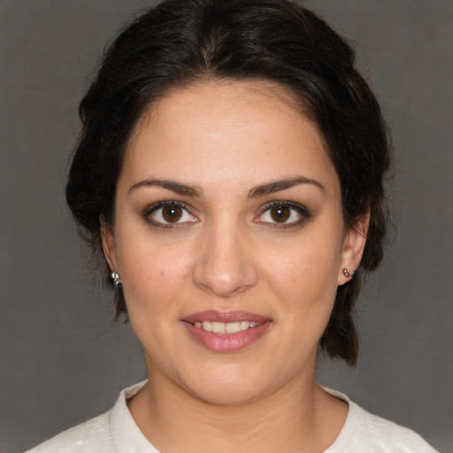 Joyful white young-adult female with medium  brown hair and brown eyes