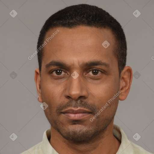 Neutral black young-adult male with short  black hair and brown eyes
