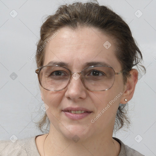 Joyful white adult female with short  brown hair and brown eyes