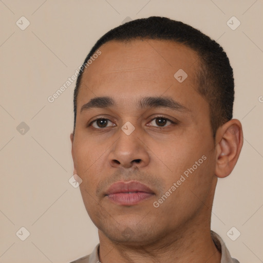 Neutral latino young-adult male with short  black hair and brown eyes