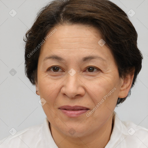 Joyful white adult female with short  brown hair and brown eyes