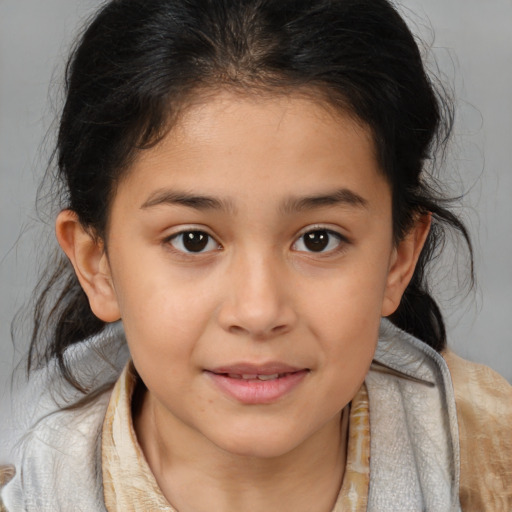 Joyful white child female with medium  brown hair and brown eyes