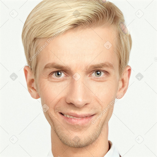 Joyful white adult male with short  brown hair and blue eyes