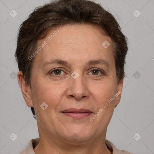 Joyful white adult female with short  brown hair and brown eyes