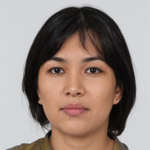 Neutral asian young-adult female with medium  black hair and brown eyes