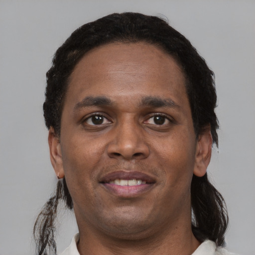 Neutral black young-adult male with short  black hair and brown eyes