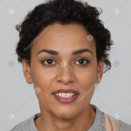 Joyful black young-adult female with short  brown hair and brown eyes