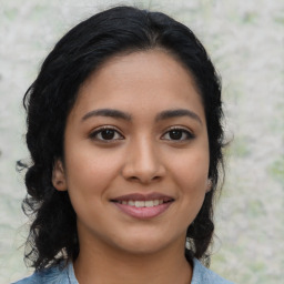 Joyful latino young-adult female with medium  black hair and brown eyes