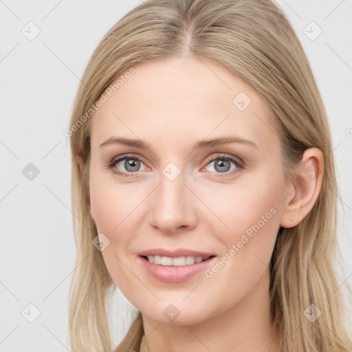 Joyful white young-adult female with long  brown hair and grey eyes