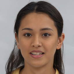 Joyful asian young-adult female with long  brown hair and brown eyes