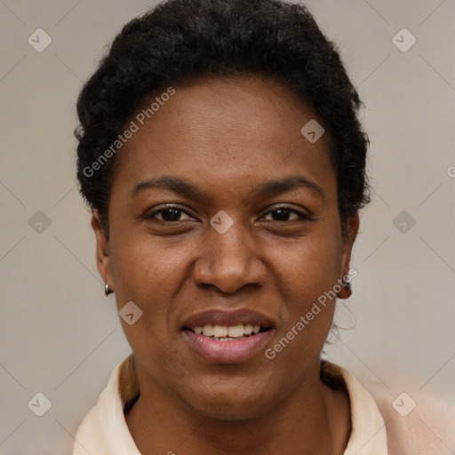 Joyful black young-adult female with short  brown hair and brown eyes