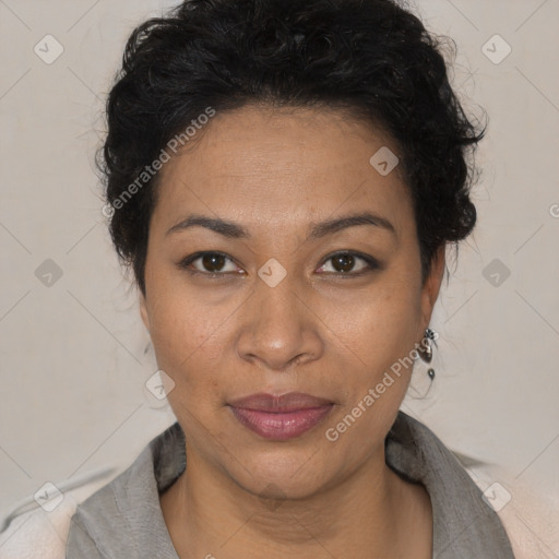 Joyful black adult female with short  brown hair and brown eyes