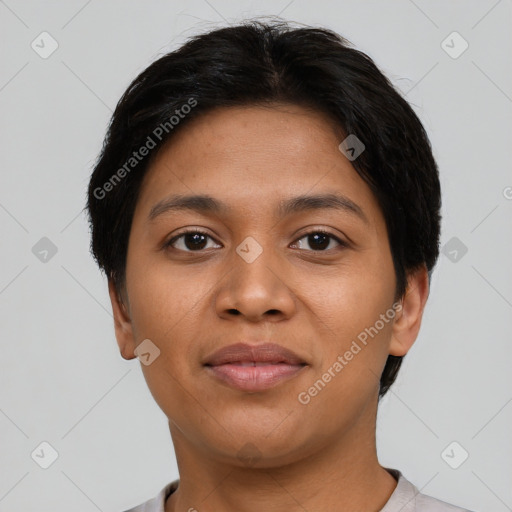 Joyful latino young-adult female with short  brown hair and brown eyes