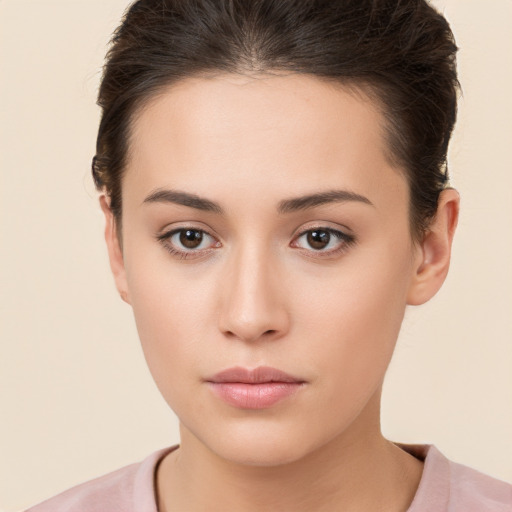 Neutral white young-adult female with short  brown hair and brown eyes