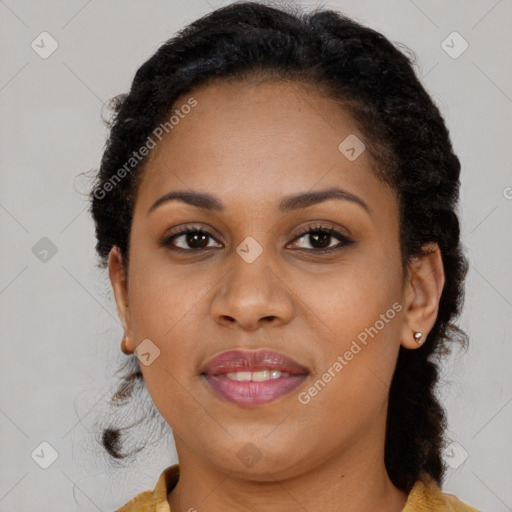 Joyful black young-adult female with medium  brown hair and brown eyes