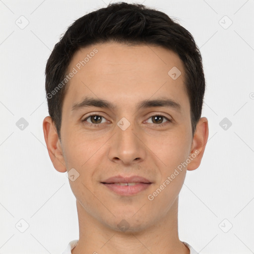 Joyful white young-adult male with short  brown hair and brown eyes