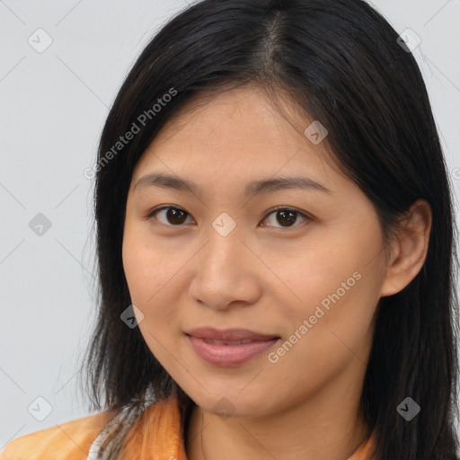 Joyful asian young-adult female with long  brown hair and brown eyes