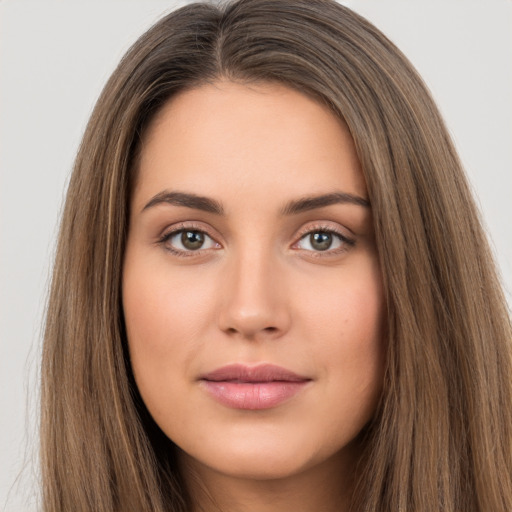 Neutral white young-adult female with long  brown hair and brown eyes