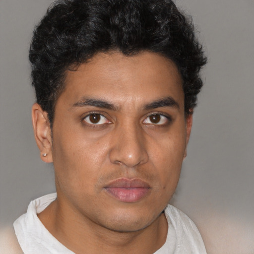 Neutral latino young-adult male with short  brown hair and brown eyes