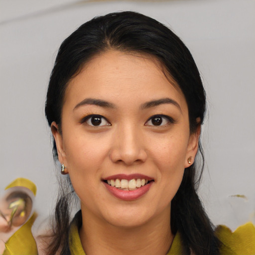 Joyful white young-adult female with medium  black hair and brown eyes