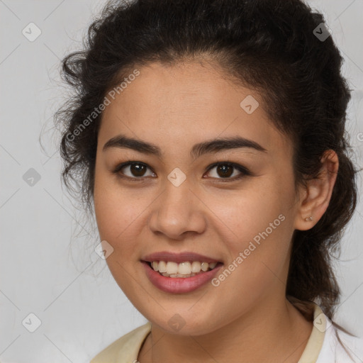 Joyful latino young-adult female with medium  brown hair and brown eyes