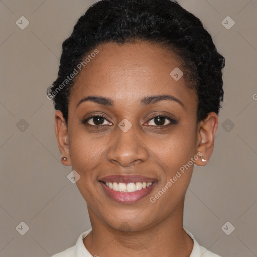 Joyful latino young-adult female with short  black hair and brown eyes