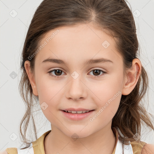 Joyful white child female with medium  brown hair and brown eyes