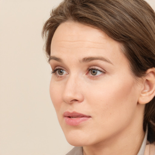 Neutral white young-adult female with medium  brown hair and brown eyes