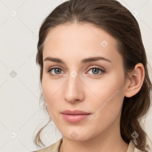 Neutral white young-adult female with medium  brown hair and grey eyes