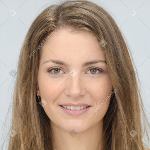 Joyful white young-adult female with long  brown hair and green eyes