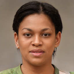 Joyful latino young-adult female with short  brown hair and brown eyes