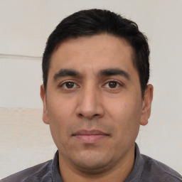 Neutral white adult male with short  black hair and brown eyes