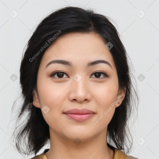 Joyful asian young-adult female with medium  brown hair and brown eyes