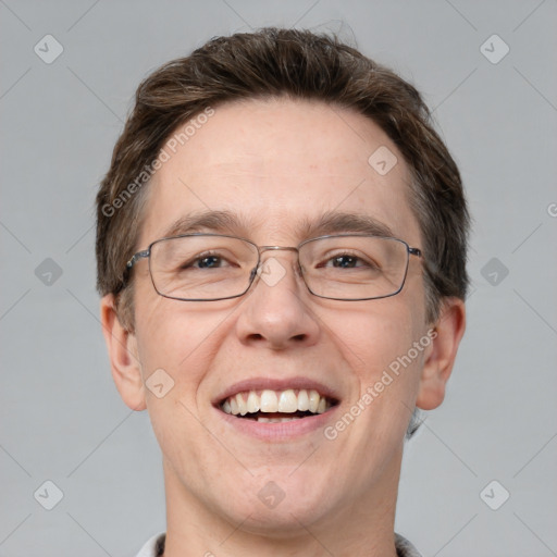 Joyful white adult male with short  brown hair and grey eyes