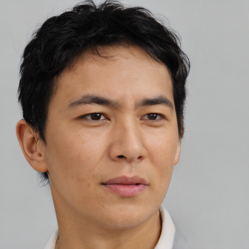 Neutral asian young-adult male with short  brown hair and brown eyes