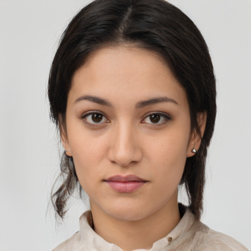 Neutral white young-adult female with medium  brown hair and brown eyes
