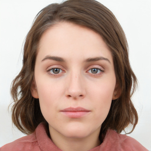 Neutral white young-adult female with medium  brown hair and blue eyes