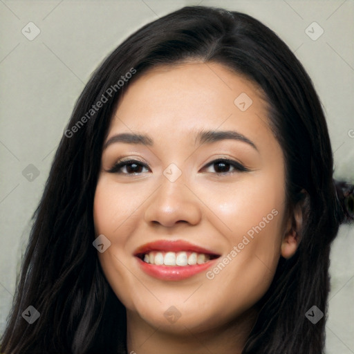 Joyful latino young-adult female with long  black hair and brown eyes