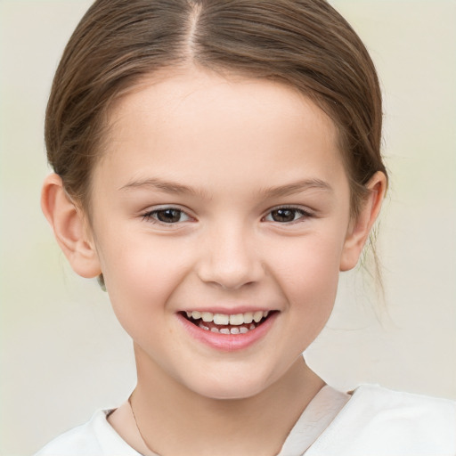 Joyful white child female with medium  brown hair and brown eyes