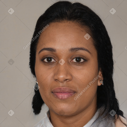 Joyful black adult female with medium  black hair and brown eyes