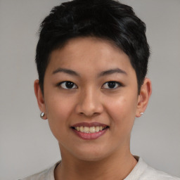 Joyful asian young-adult female with short  brown hair and brown eyes