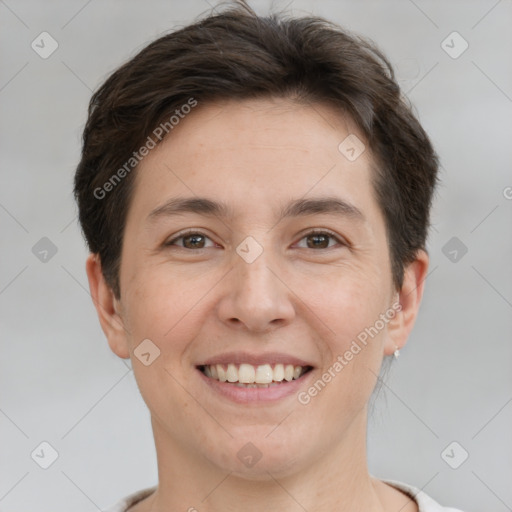 Joyful white young-adult female with short  brown hair and brown eyes