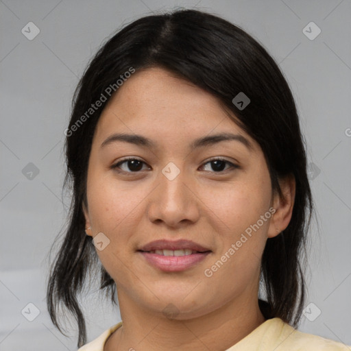 Joyful asian young-adult female with medium  brown hair and brown eyes