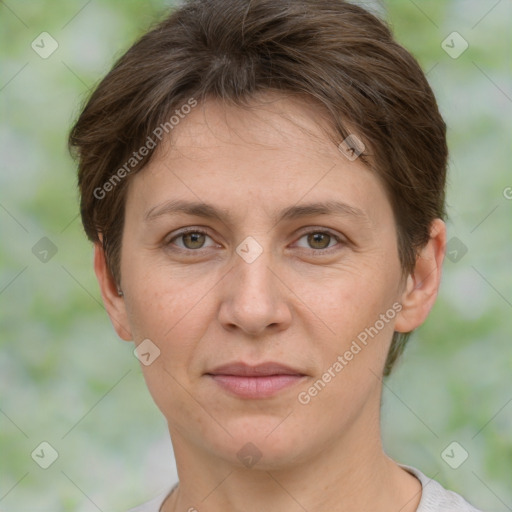 Joyful white adult female with short  brown hair and brown eyes